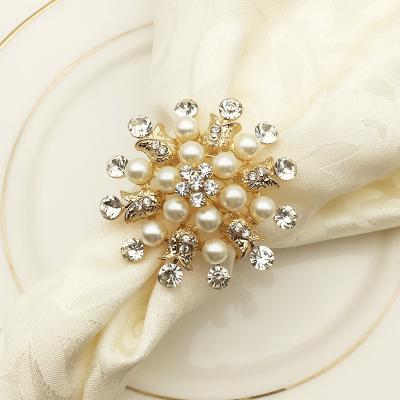 China Restaurant Sustainable Elegant Gold Plated Shiny Metal Napkin Rings Rhinestone Snowflake Napkin Rings for sale