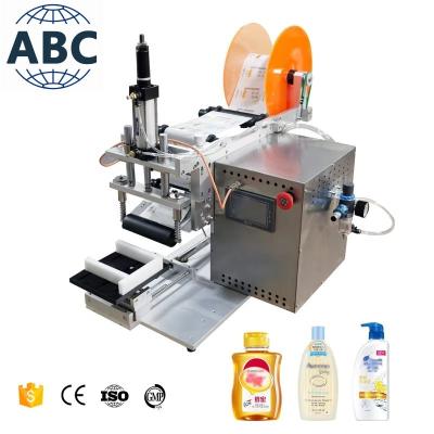 China New Style Design 50Ml Refillable Home Aromatherapy Flat Glass Bottles Manual Flat Labeling Machine for sale