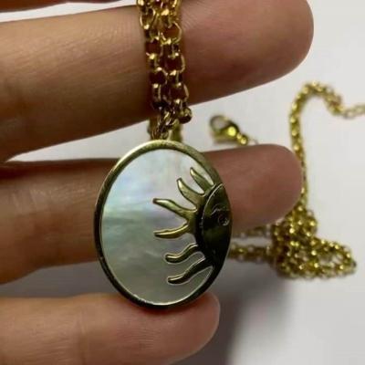 China Trendy Skyline High Quality 18K Gold Plated Pearl Shell Sun Stainless Steel Necklace Tarot Jewelry Necklace for sale