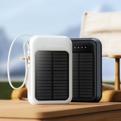 China Protable Charger Solar Energy Sharing Four-wire Charging Power Supply 20000 mah Outdoor Mini Mobile Power Bank With Wire for sale