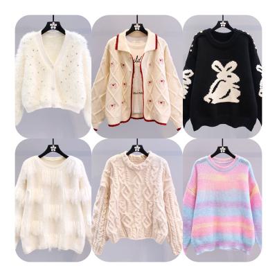 China Anti-wrinkle Embroidery Jacquard Knitting Latest Design Women's Cardigan With Pockets Loose Cardigan Women's Sweater for sale