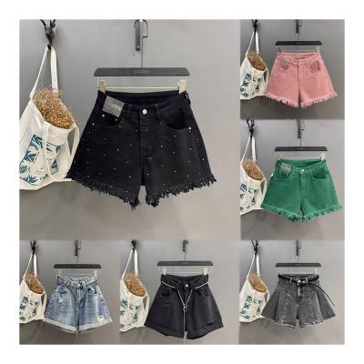 China Anti-wrinkle Summer Pocket Tassel Perforated Jeans Vintage Casual Comfortable Denim Button Zipper Pants Women's Shorts Jeans for sale