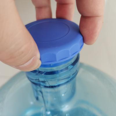 China Non Spill Amazon Hot Selling 5 Gallon Silicone Reusable Water Jug Intake Caps Non Spill Lid Cover Top Cap For 55mm Water Bottle for sale