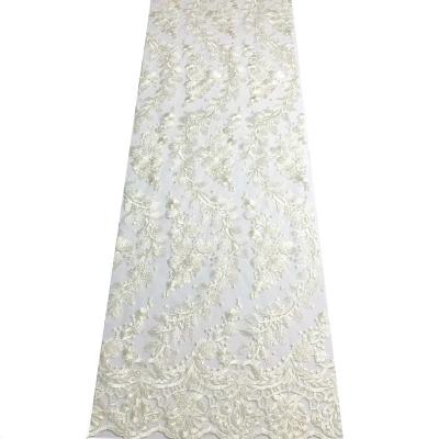 China 2022 New Machine Embroidered Most Popular Machine Embroidered Lace Fabric White Beaded Tulle Tulle Fabric Viable For Party Dress for sale