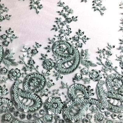 China Workable Well Designed Beaded 100% Polyester Tulle Fabric Lace Fabric With Beads For Dress for sale