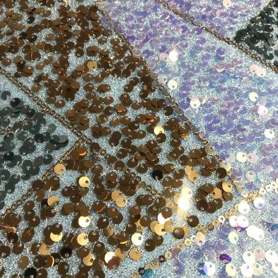 China 2021 New Fashion Viable Iridescent 100% Sequins Polyester Wholesale Ready Made Fast Delivery 100% Sequins Lace Up For Knitting Club Dress Fabric for sale