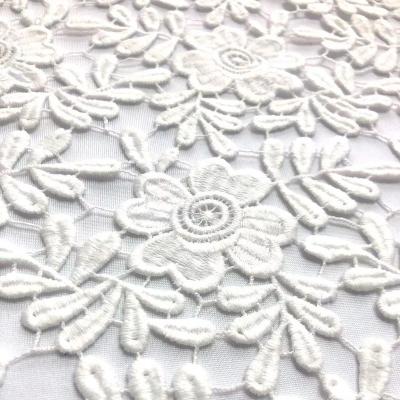 China Viable Elegant White Color Chemical Polyester Embroidery Fabric Heavy Guipure Lace Fabric Embroidery For Dress for sale