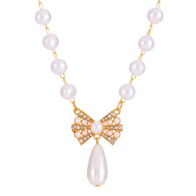 China High Quallity Diamond-set pearl necklace for women vintage fashion style bow pendant clavicle chain for sale