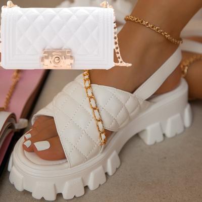 China Fashion Trend Chunky Cross Chain Wedge Thick Bottom Platform Heeled Sandals Shoes Slides And Matching Mini Jelly Purse Bag Set 2021 for sale