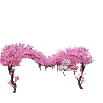 China New Design Customized Artificial Pink Decorative Arched Cherry Blossom Tree Wholesale Eco-Friendly For Indoor for sale