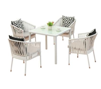 China Easy carry outdoor rattan table iron yard rattan and outdoor Nordic balcony tea table three-piece chair set small for sale