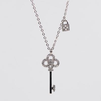 China Tiny Clavicle Chain Zircon Jewelry Charm Lock Key Romantic Eco-Friendly Copper Pendant Necklace for sale