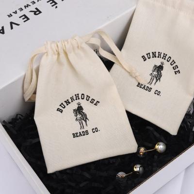 China Custom Natural Logo Printed Cotton Lipstick Cosmetic Dust Bag Drawstring Safety Muslin Jewelry Packaging Pouch for sale