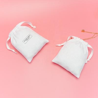 China Recyclable Luxury Printing White Dust Bag For Bag Cotton Twill Drawstring Mini Bags For Jewelry Small Custom Cotton Pouch for sale