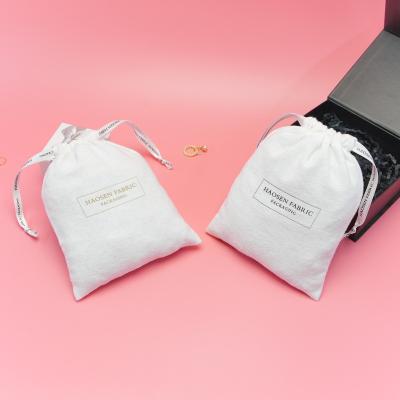 China Recyclable Personalized Custom White Logo Cotton Flannel Cotton Drawstring Bag Flannel Purse Dust Bags for sale