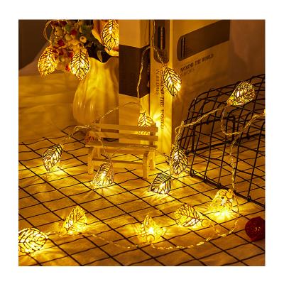 China Hawaii Frangipani Flower Art Gold Leaf Hollow Battery Iron Powered String Fairy Lights RGB String Lights with Leaves for sale