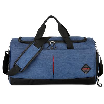 China Fashion Packable 65L Polyester Duffle Bag Water Resistant Unisex Durable Duffel Bag With Shoes Compartment for sale