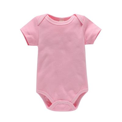 China Quick Dry 0-2 Years Newborn Baby Girl Solid Soft Cotton Male And Female Short Newborn Baby Clothes for sale