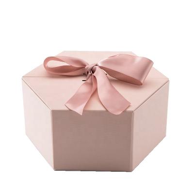 China Recycled Materials Bowknot Flower Box Hexagonal Exquisite Silk Gift Box For Trademark Customization for sale