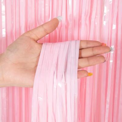 China Customizable Waterproof Fluorescent Pink Foil Fringe Curtain Festive Occasion Decoration Eco Friendly for sale