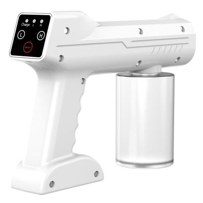 China Sanitizing Wireless Electric Blue Light Nano Rechargeable Sanitizing Sterilizer Gun Atomizer Spray Gun Portable Touch Screen Sanitizer for sale