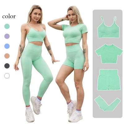 China New Four-Piece Yoga Seamless Seamless Breathable Suit Hip Lifting Bra And Shorts Fitness Workout Sportswear Set For Women for sale