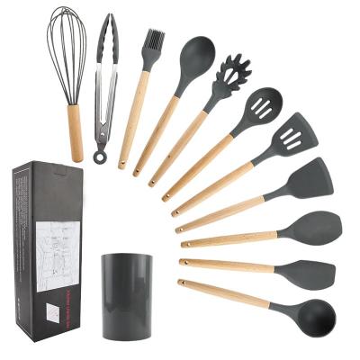 China Amazon Sustainable Hot Sale 9-Piece Silicone Cookware Set , Wooden Handles Cooking Tool for sale