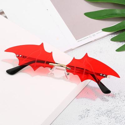 China New Fashion Sunglasses Fashion Bat Shape Halloween Sunglasses Men and American Fashionable Concave Rimless Men Women Sunglasses for sale