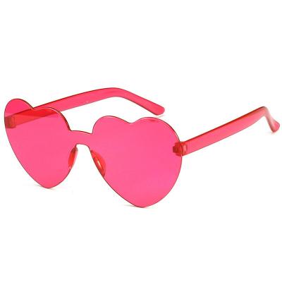 China Fashion Sunglasses Hot Seller Candy Color Fashion One Piece Ladies Wear Beach Travel Eyewear Heart Shaped Sunglasses Party Glasses Sun for sale