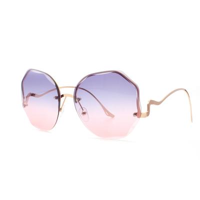 China Hot Selling 100% Ladies Designer Sunglasses Ladies Fashion Luxury Rimless Sunglasses UV Sun Glasses 2022 for sale