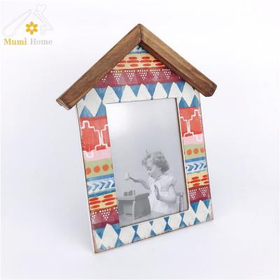 China Custom House Retro Mumi Shape Photo Frame Smart Baby Welcome Photo Frame for sale