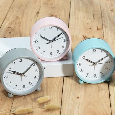 China LUMINOVA 4 Inch Round Alarm Clock Non Ticking With Super Silent Night Light Quartz Alarm Clock for sale