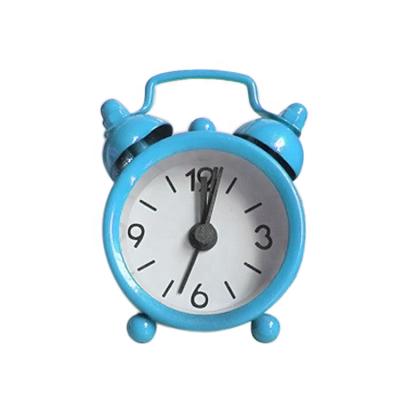 China LUMINOVA 1 inch mini alarm clock a metal quartz child's alarm clock that can be carried around for sale