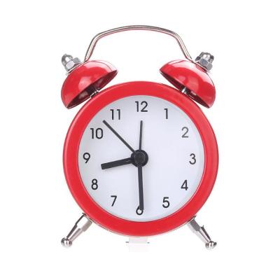 China LUMINOVA Mini Portable Cute Analog Quartz Round Desk Alarm Clock Travel Clock for sale