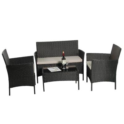 China Balcony durable furniture simple rattan lounge chairs European courtyard outside the wicker chair coffee table combination of four sets for sale