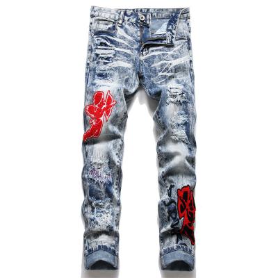 China Viable made in China retro punk fashion blue perforated men's jeans slim fit stretch denim gaiters men for sale