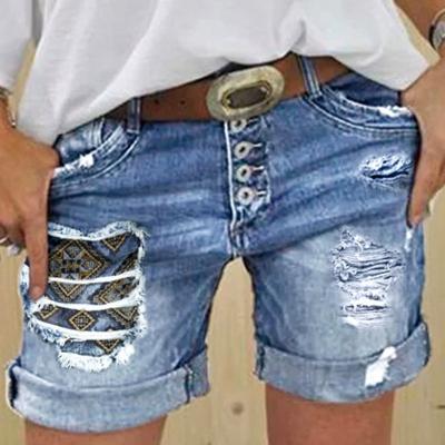 China Women's breathable denim shorts multi button holes loose blue jeans fashion 2022 plus size printed street straight women's pants clothing for sale