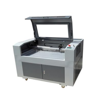 China Laser CUTTING 600*400 Chessboard Mobile Phone Shell Laser Engraving Machine With Exhaust Fan for sale