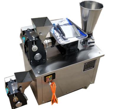 China Can do many styles of food factory low price 110v/220v motor dumpling machine plant/curry puff machine for sale