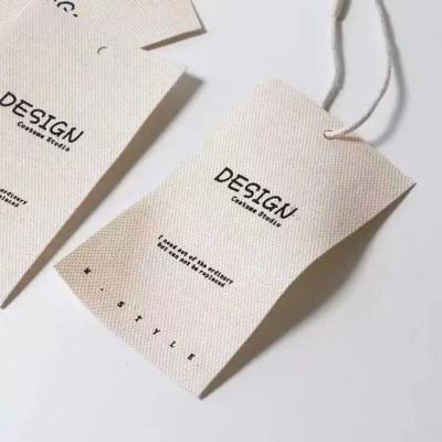 China Sustainable Recyclable Canvas Swing Label Custom Clothing Label for sale