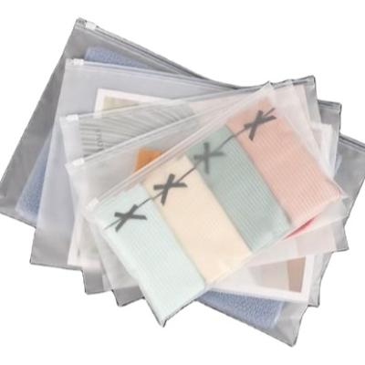 China Plastic Custom Shirt Garment Package Disposable Frosted Zipper Printed Bag For Packing for sale