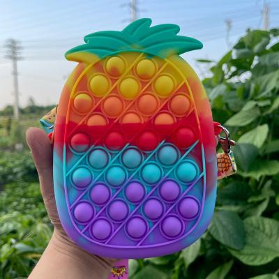 China New Macaron Color Pineapple Hot Push Bubble Stress Anti-Anxiety Selling Sensory Noises Relieve Itting Wiggle Toy Sling Bag For Kids for sale