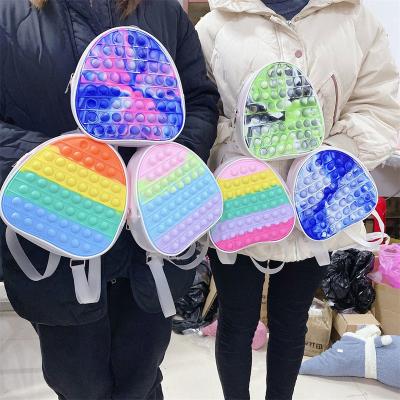 China Relieve Stress Anti-Anxiety Wholesale Kid Toy Push Bubble Fidget Silicone Backpack Noise Transparent Bag For Boys Girls Rainbow 3D Pop Itting Backpack for sale