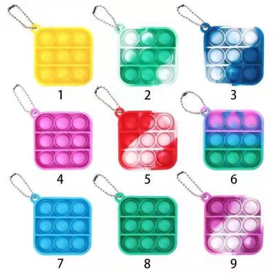 China Relieve Stress Anti-anxiety Amazon Selling Rainbow Silicone Mini Keychain Push Bubble Sensory Noise Itting Hot Toy Heart Square Keychain for sale