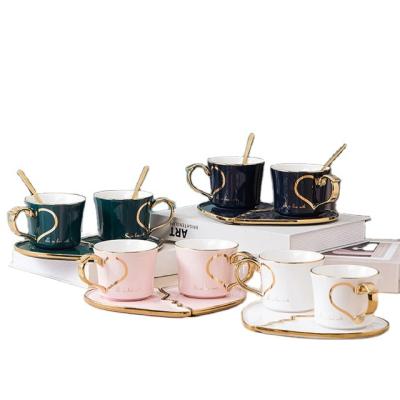 China One Of A Pair Heart Viable Coffee Cups With Saucers And Spoons In Gift Wedding Couples Luxury Ceramic Rim Creative Tea Cup Set Gold for sale