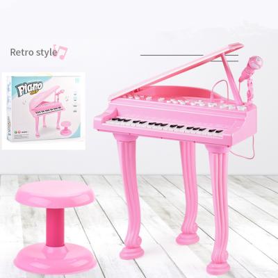 China Toy Children's Multifunctional 37 Battery Operated Keys Grand Piano Electronic Keyboard Toy With Microphone for sale