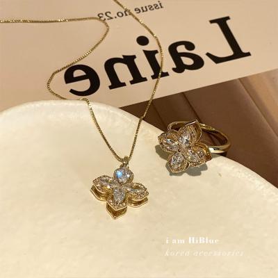 China CLASSIC Silver S925 Needle Four Leaf Clover Necklace Ring Earring Damping Rotating Windmill Earrings for sale