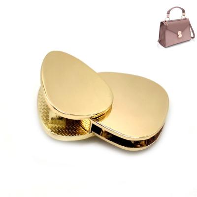 China Exquisite Accessories Oval Zinc Alloy Metal Hardware Zinc Alloy Metal Hardware New Fashion Press Bag Press Bag Rotary Lock for sale