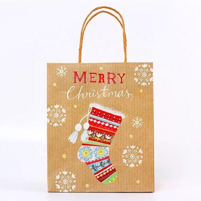 China Wholesales Recyclable Cheap Recycled Brown Kraft Custom Logo Christmas Gift Packaging Paper Bag With Handles for sale