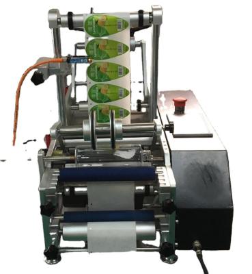 China Beverage Round Bottle Adhesive Labeling Machine for sale